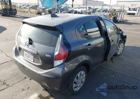 2015 Toyota Prius C from USA, damaged, VIN JTDKDTB33F1583432